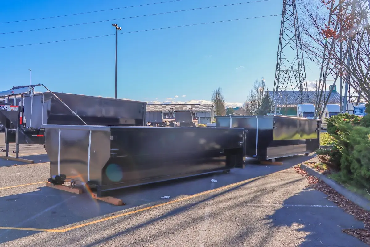 Roll-off dumpster ready for waste disposal at job site for Yard Waste Dumpster Rental in Manvel